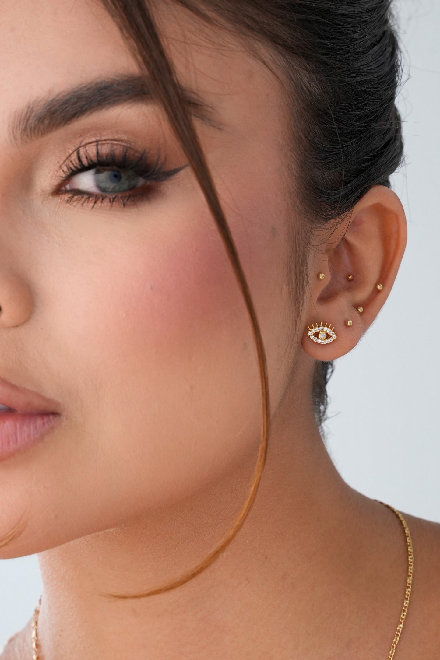 Aretes Topo Ojo Turco Cristal